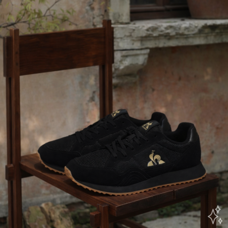 JET STAR Noir Or, Baskets running Le Coq Sportif